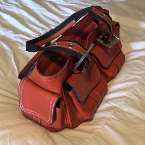 Small burnt-orange purse